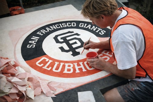 Hand-painting custom circular logo sign in San Francisco