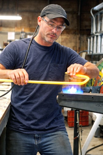 Neon sign maker bending custom neon tubing